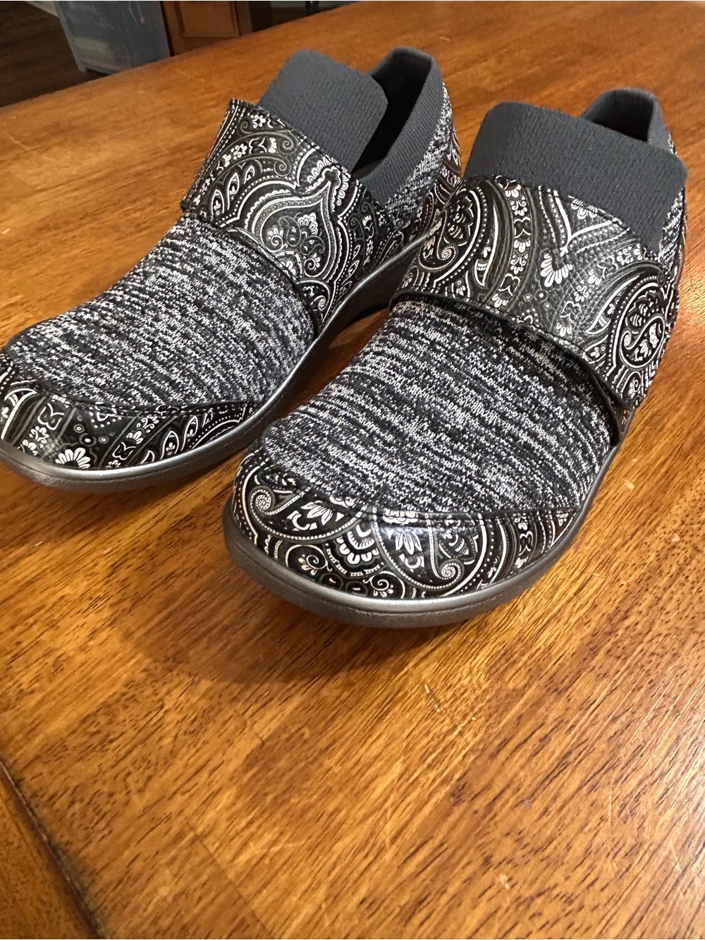 TRAQ by Alegria Mules in Black and Gray Paisley Knit